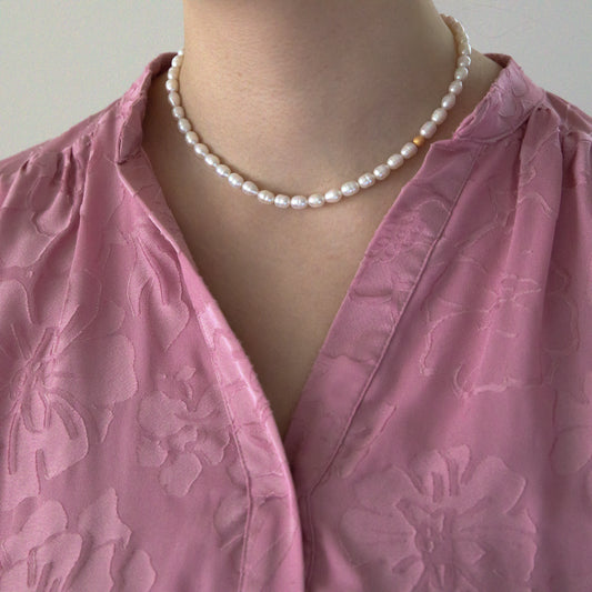 Perlų vėrinys Geneviève